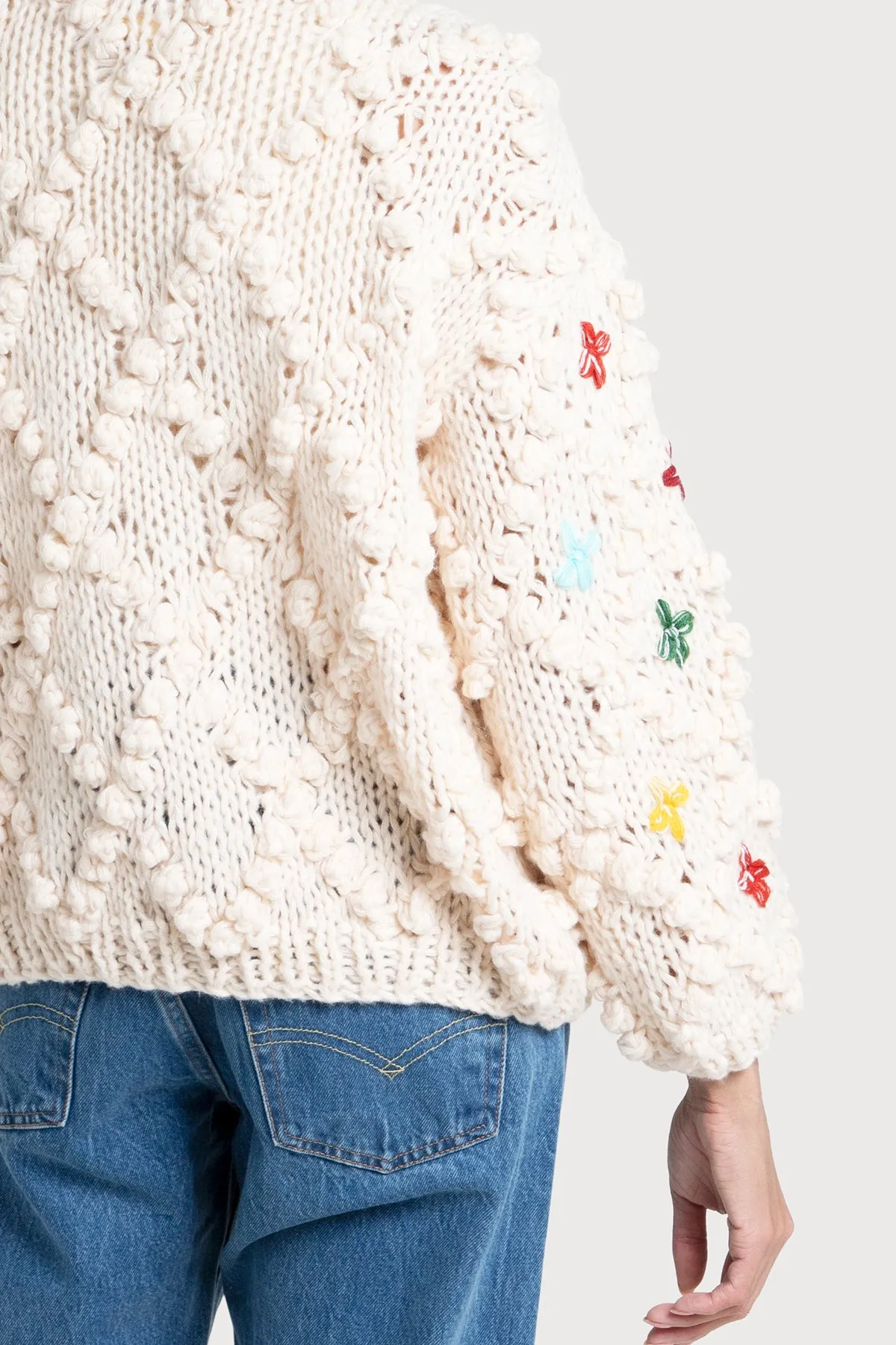 Knitted Cardigan Cross Pom Pom